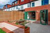 Studio pena Architect Peach Melba Contemporary Brick Extension Green Windows 2